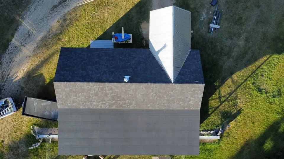 Drone aerial of a home and autumn trees in the Flathead Valley